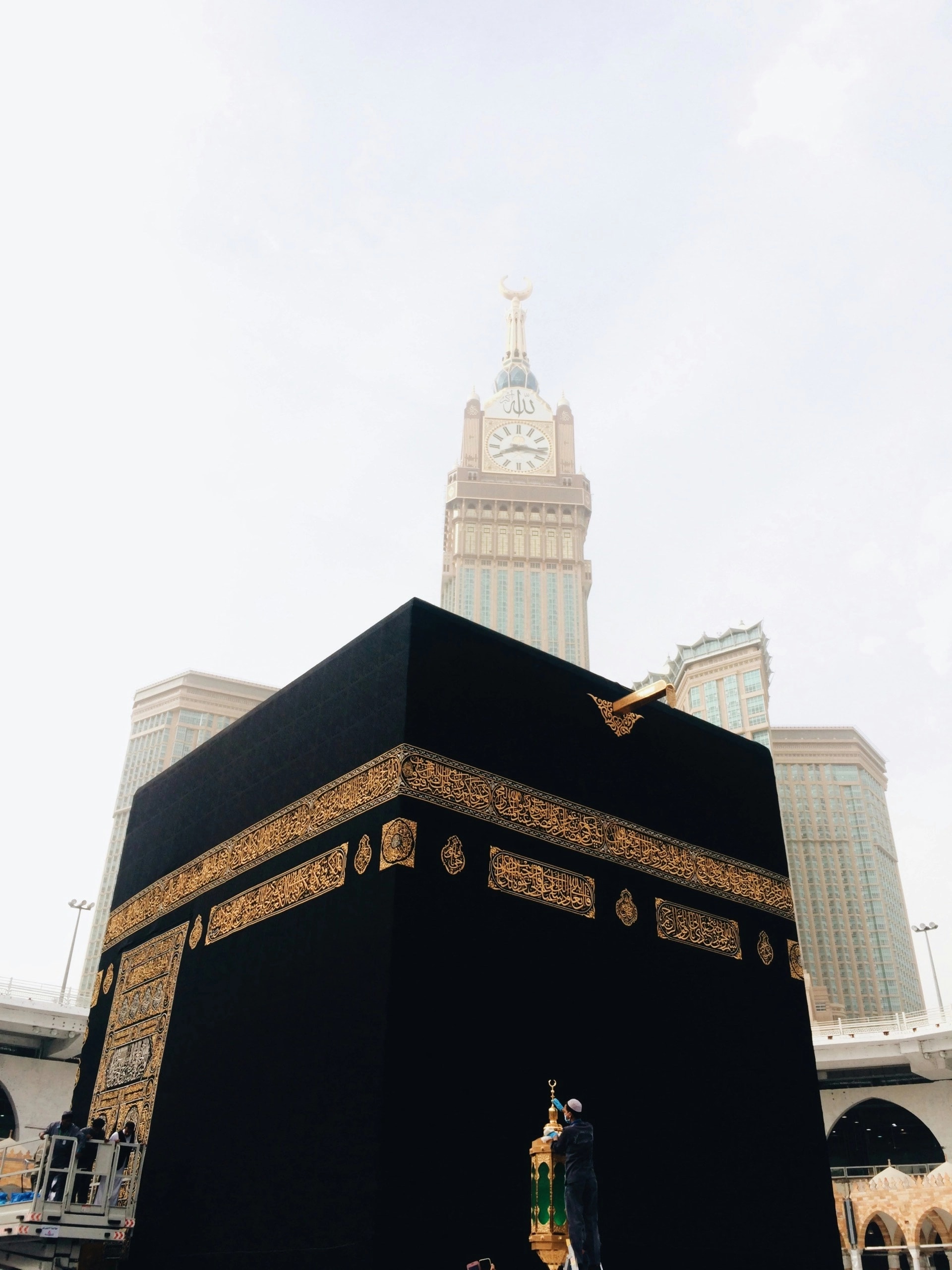 The Kaaba in Mecca with the Abraj Al-Bait clock tower rising behind it