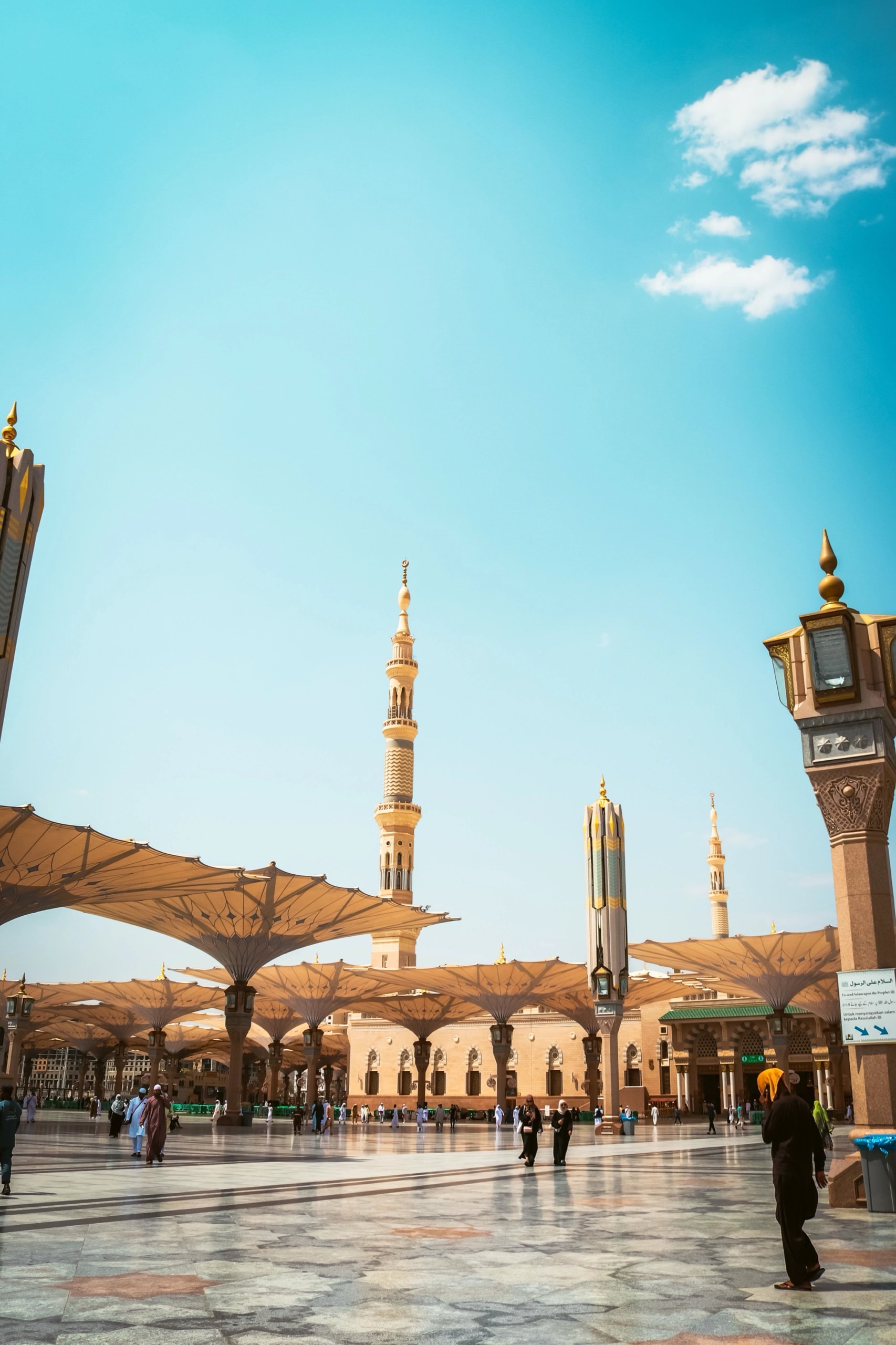The courtyard of the Prophet's Mosque in Medina, with its minarets